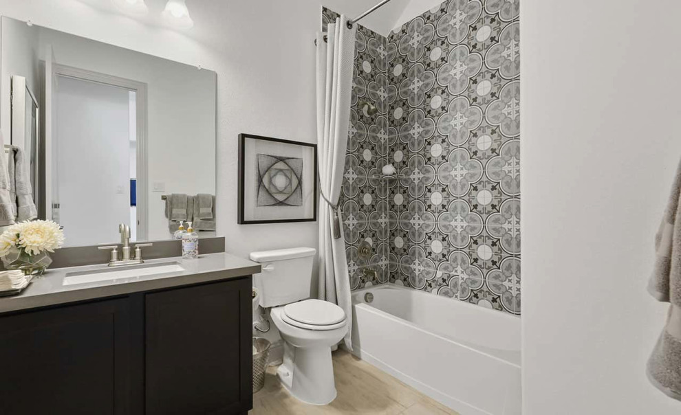 Photo of a contemporary bathroom in Dallas with recessed-panel cabinets, an alcove tub, an alcove shower, white walls, ceramic floors, an integrated sink, beige floor, a shower curtain, grey benchtops, a double vanity, a built-in vanity and black cabinets.