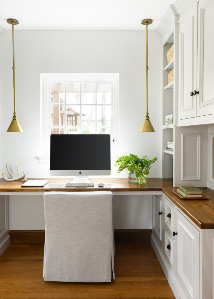 Design ideas for a transitional home office in Boston.