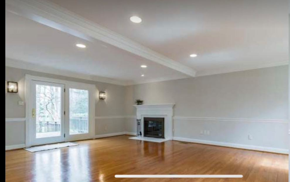 Living room family room combo (great room) and off center fireplace