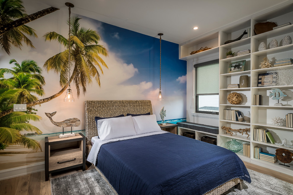 Beach style kids' bedroom in Orlando with multi-coloured walls, medium hardwood floors and brown floor for boys.