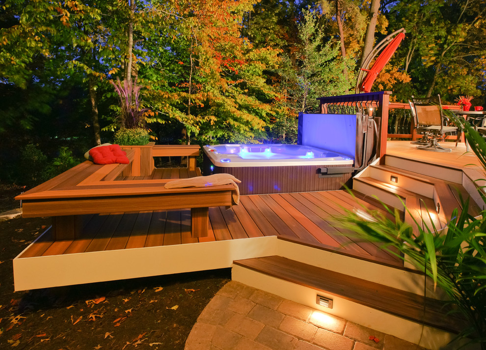 Inspiration for a large traditional backyard deck in DC Metro with no cover.