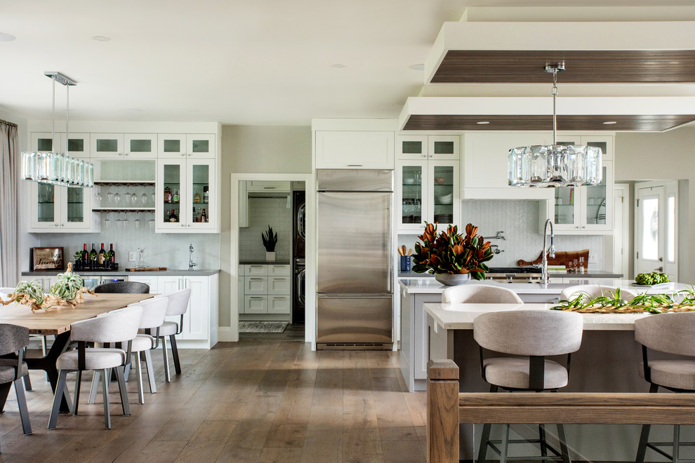 Transitional kitchen photo in Toronto with two islands