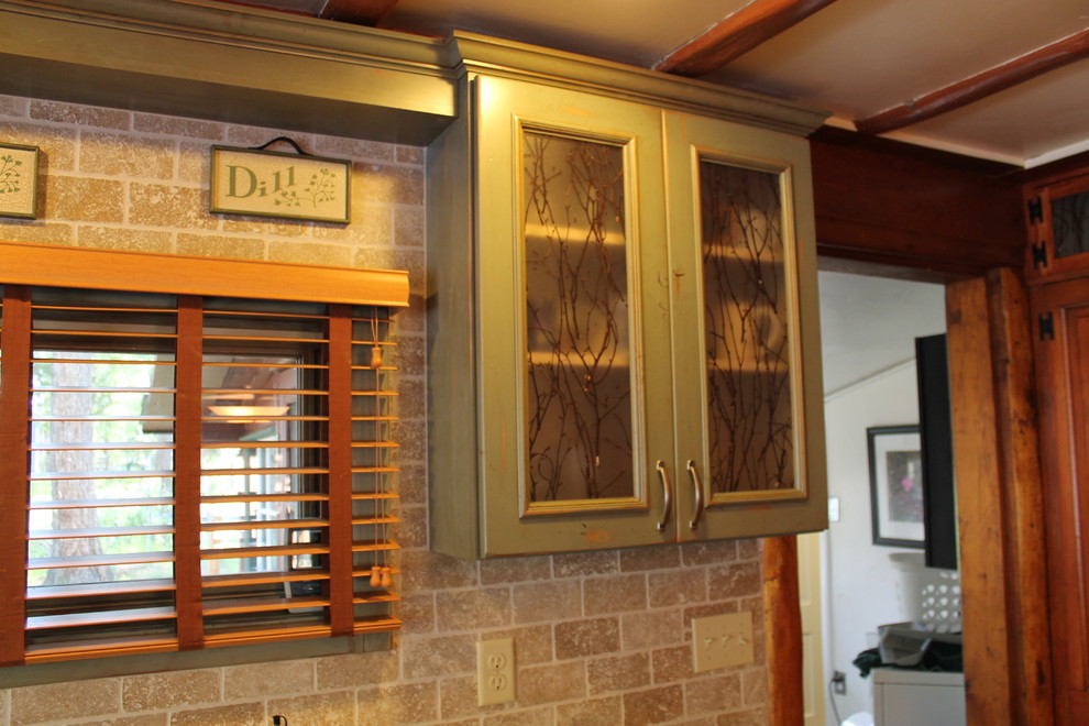 Example of a mid-sized mountain style home design design in Denver