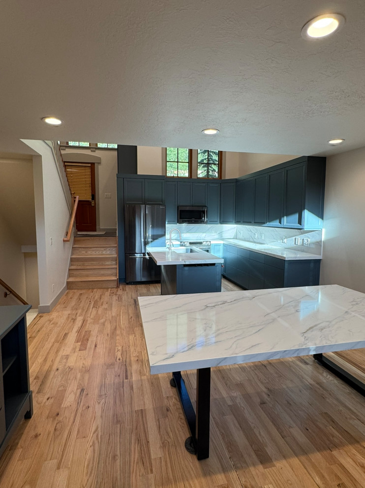 Custom kitchen cabinets, matching countertops, island, back splash, new custom t