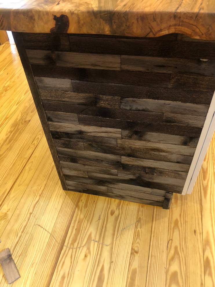 Inspiration for a mid-sized rustic home design remodel