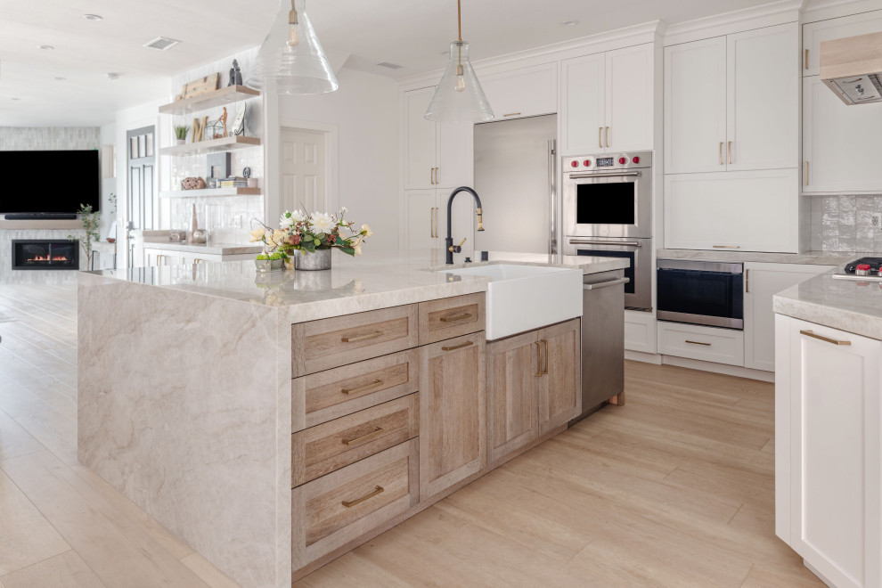 Example of a huge transitional kitchen design in Orange County
