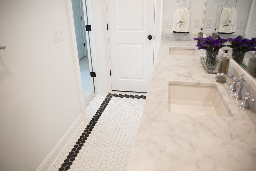 Mid-sized contemporary 3/4 bathroom in Birmingham with an alcove shower, black and white tile, porcelain tile, porcelain floors, recessed-panel cabinets, white cabinets, a one-piece toilet, white walls, an undermount sink and marble benchtops.