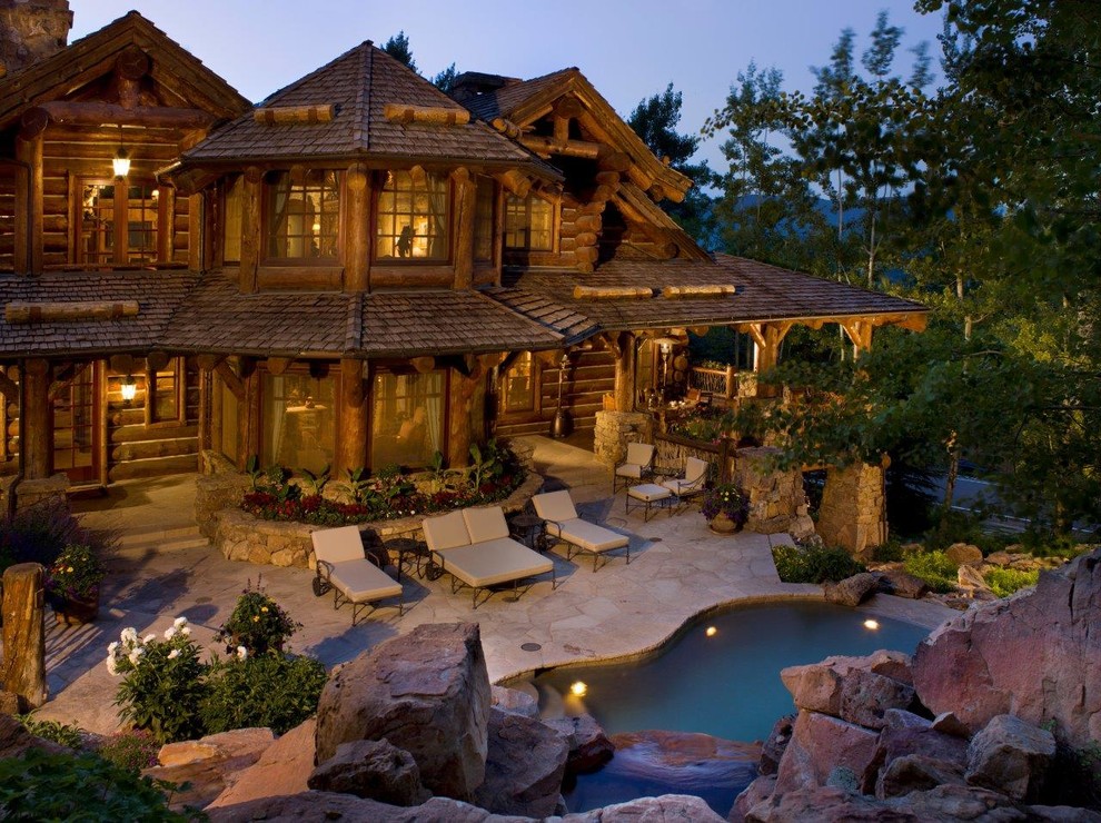 This is an example of a country custom-shaped pool in Denver.