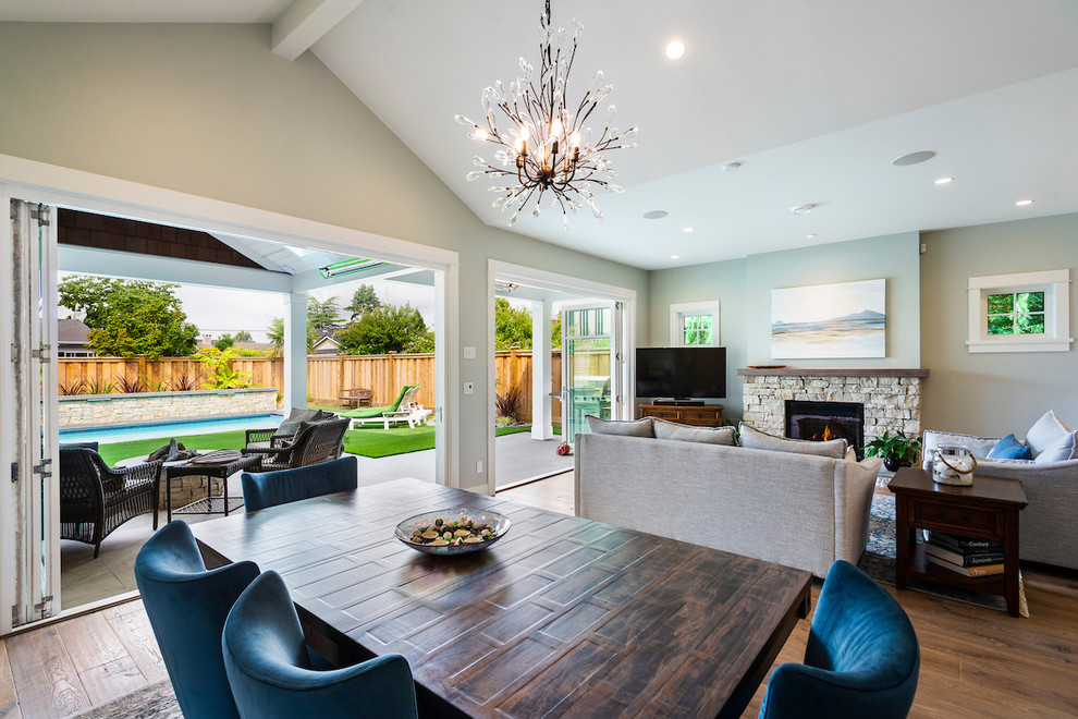 Great room - mid-sized transitional medium tone wood floor and brown floor great room idea in Vancouver with gray walls and no fireplace