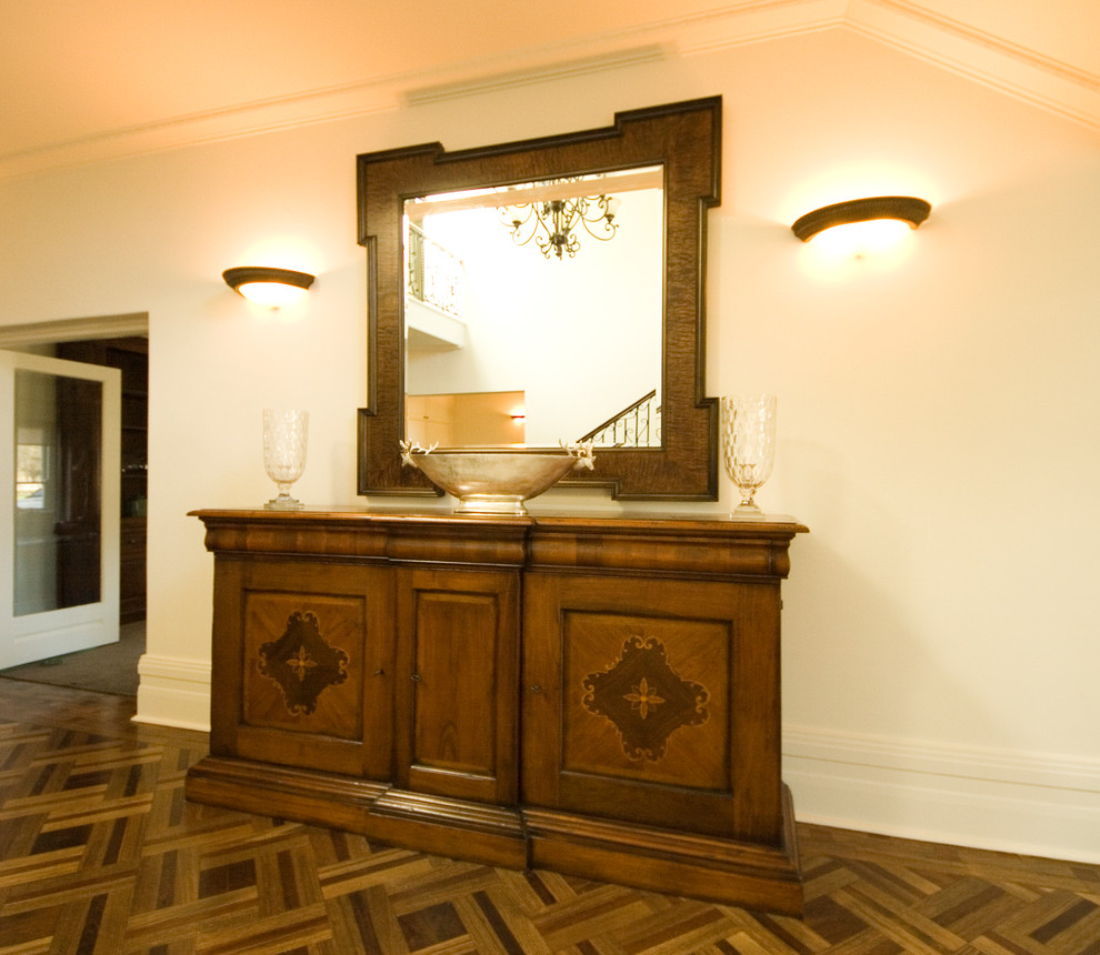 Traditional entryway in Melbourne with beige walls.