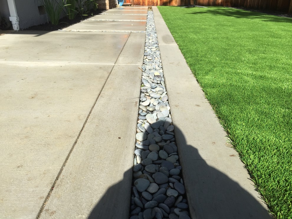 Example of a large trendy backyard rectangular and stone aboveground pool design in San Francisco