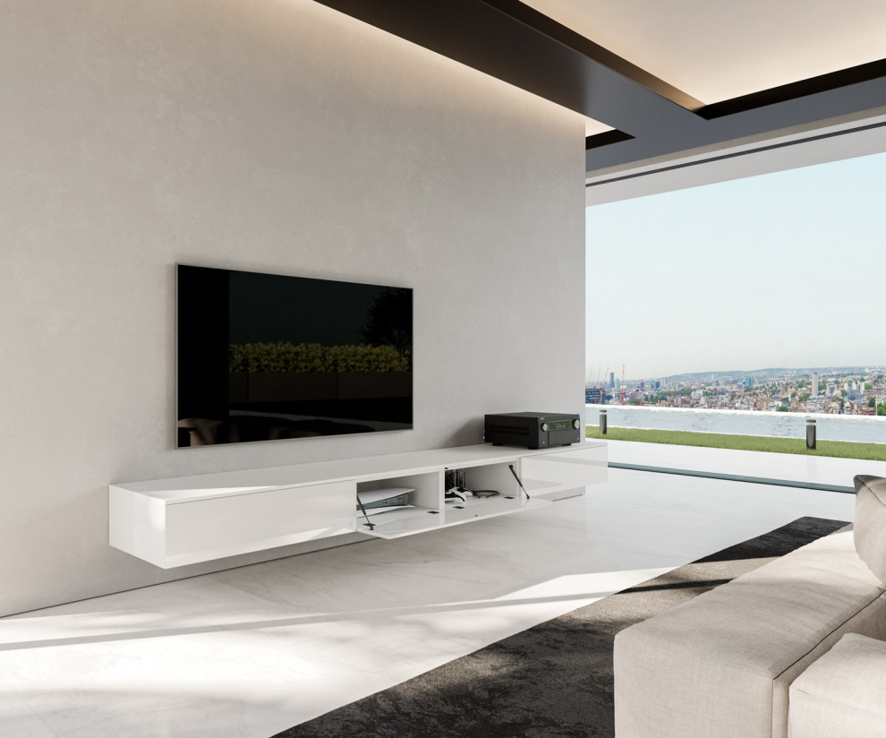 Foto di un grande soggiorno minimalista aperto con TV a parete