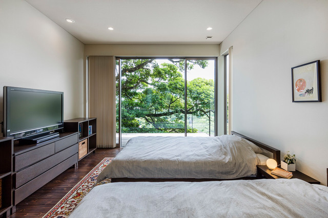 非日常な週末へと誘う崖の上に浮かんだヴィラ minimalistisch-schlafzimmer