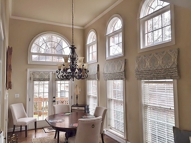 Mid-sized traditional separate dining room in Atlanta with dark hardwood floors, beige walls and brown floor.