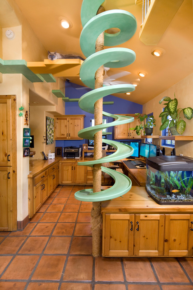 Inspiration for an eclectic home office remodel in Santa Barbara with beige walls