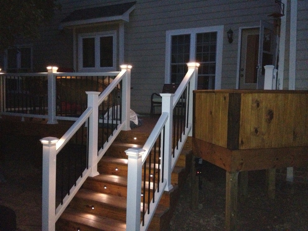 Deck - mid-sized transitional backyard deck idea in Raleigh