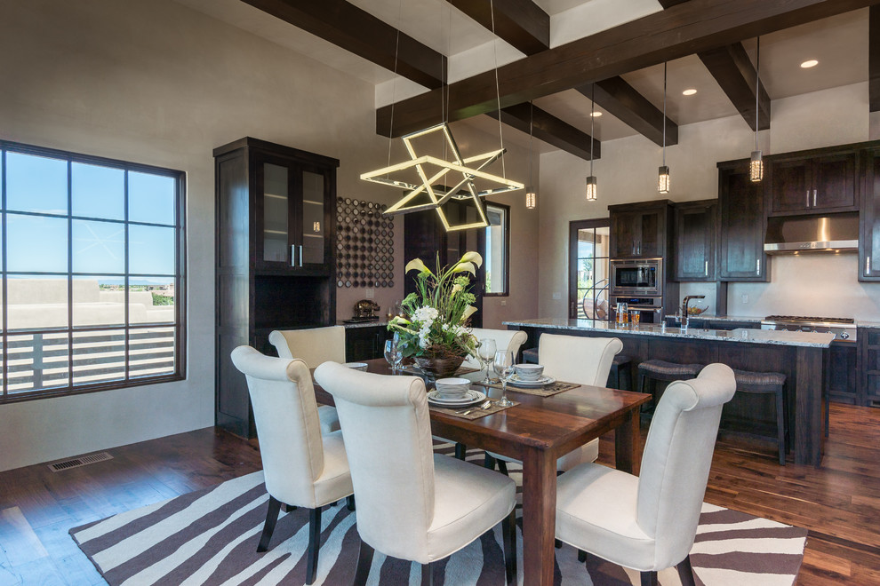 This is an example of a large transitional kitchen/dining combo in Albuquerque with beige walls, dark hardwood floors and no fireplace.