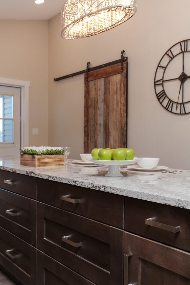 Transitional home design photo in Edmonton