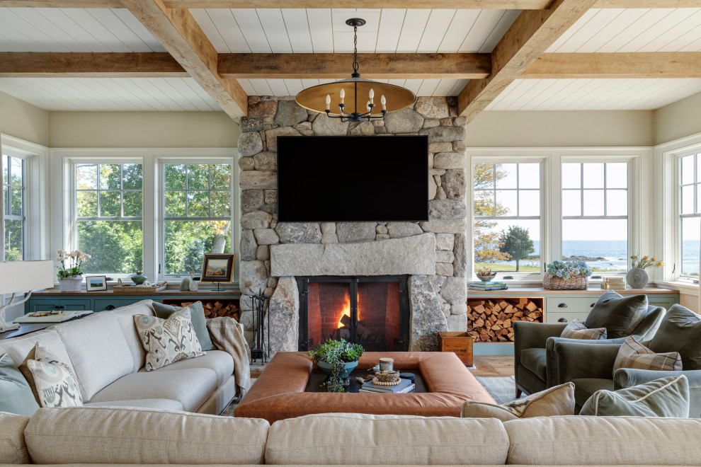 Example of a huge beach style family room design in Portland Maine