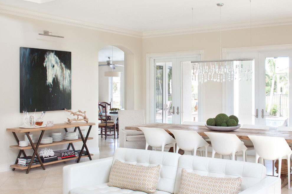 Design ideas for a large transitional open plan dining in Miami with beige walls.