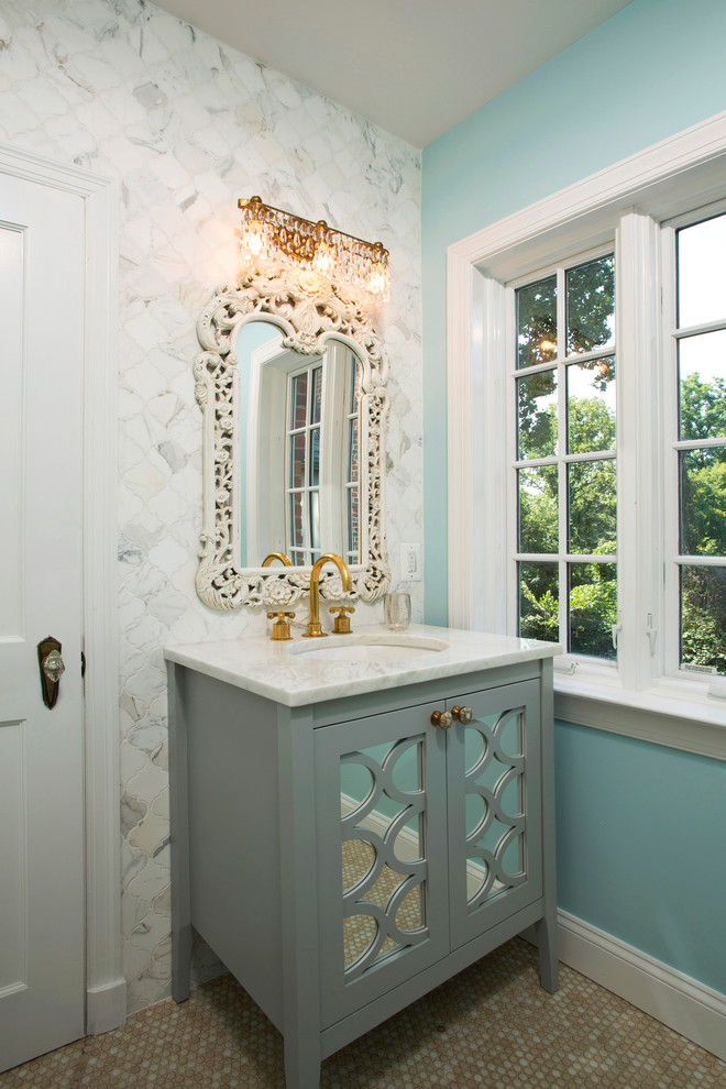 Inspiration for a mid-sized traditional 3/4 bathroom in DC Metro with an undermount sink, glass-front cabinets, grey cabinets, marble benchtops, an alcove shower, a one-piece toilet, white tile, mosaic tile, blue walls and mosaic tile floors.