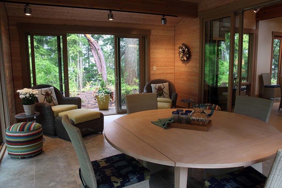 This is an example of a mid-sized arts and crafts sunroom in Seattle with ceramic floors, a standard ceiling and beige floor.