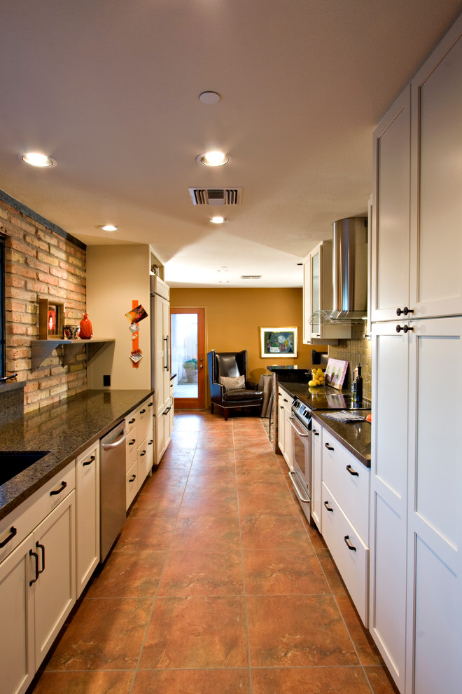 Mid-sized transitional galley ceramic tile enclosed kitchen photo in Phoenix with an undermount sink, shaker cabinets, white cabinets, quartzite countertops, gray backsplash, subway tile backsplash, stainless steel appliances and no island
