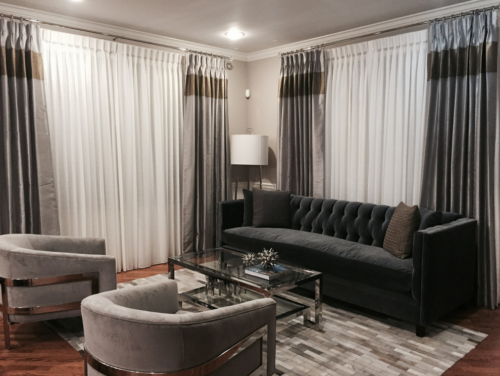 Inspiration for a small contemporary formal and enclosed medium tone wood floor living room remodel in New York with gray walls, no fireplace and no tv