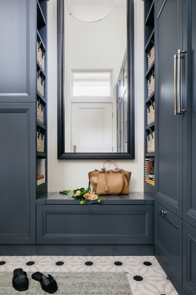 Design ideas for a mid-sized traditional mudroom in Denver with white walls, porcelain floors, a single front door, a blue front door and multi-coloured floor.