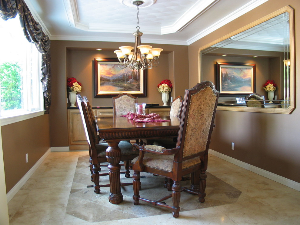 Inspiration for a mediterranean separate dining room in Santa Barbara with brown walls.
