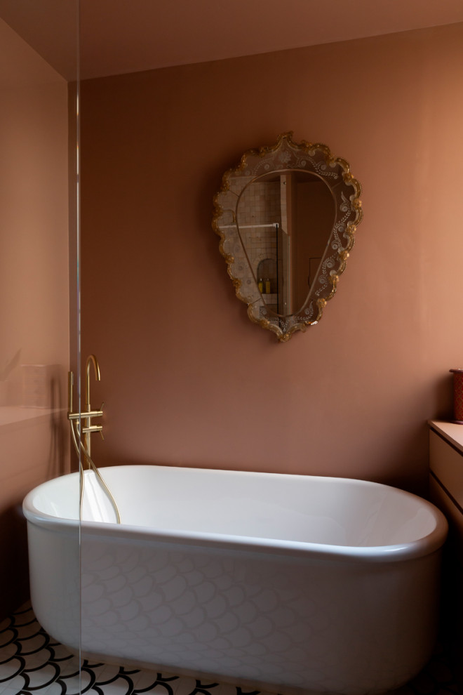 Cette image montre une petite salle de bain principale design avec un placard à porte plane, une baignoire indépendante, une douche d'angle, un carrelage blanc, un mur rose, carreaux de ciment au sol, un lavabo posé, un sol multicolore, du carrelage bicolore, meuble double vasque et meuble-lavabo sur pied.