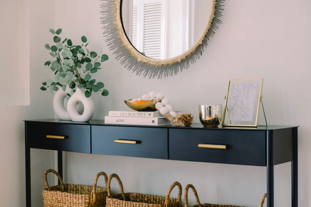 Small transitional medium tone wood floor and brown floor front door photo in New York with gray walls