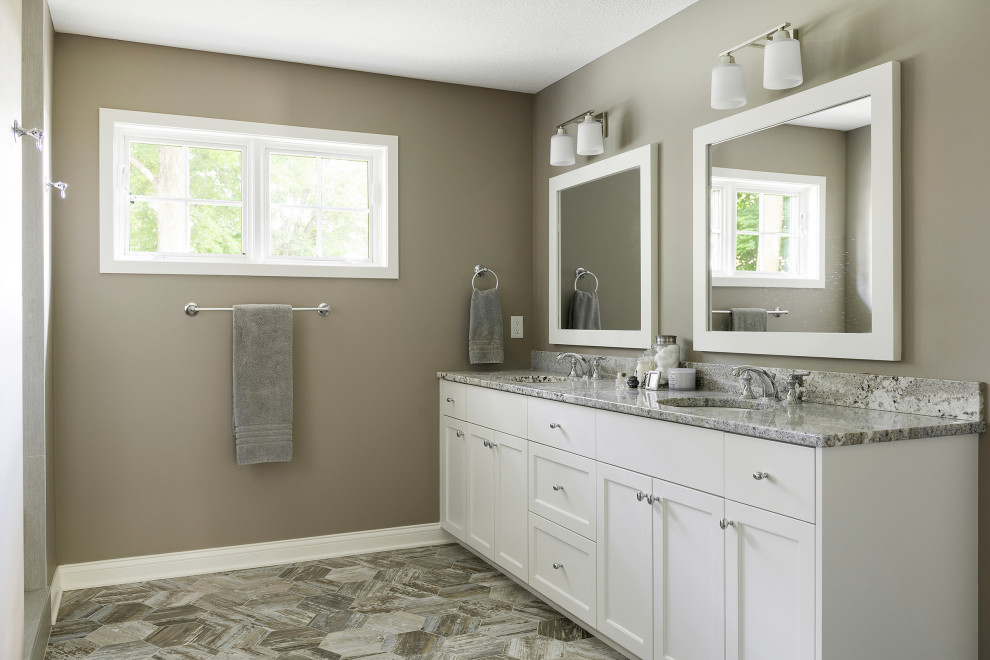 Mid-sized transitional master double-sink bathroom photo in Minneapolis with white cabinets and quartz countertops