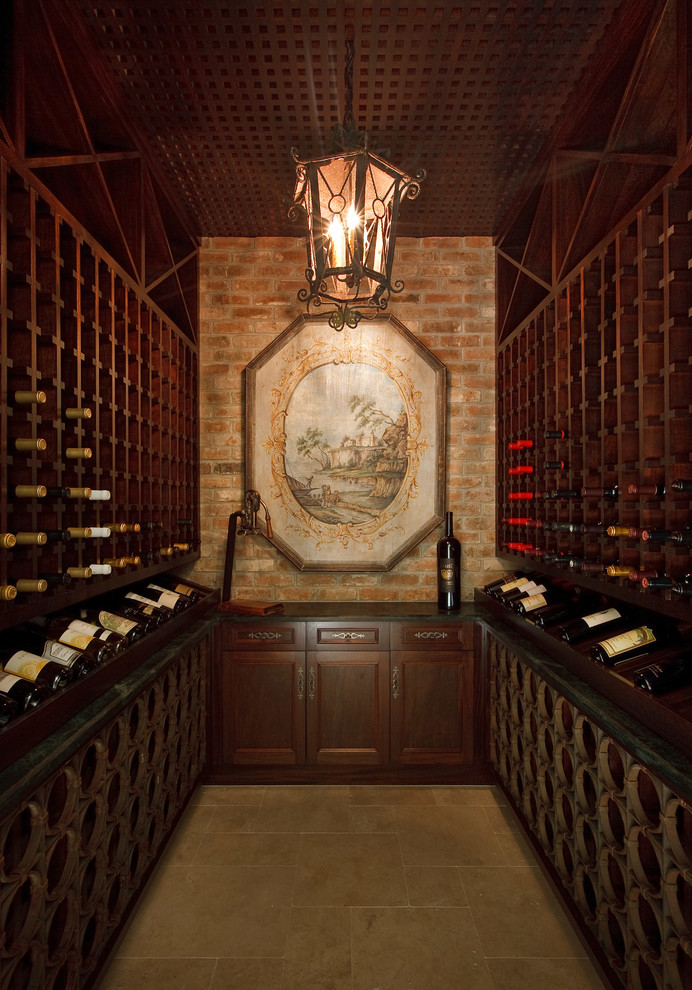 This is an example of a small traditional wine cellar in Houston with ceramic floors and storage racks.