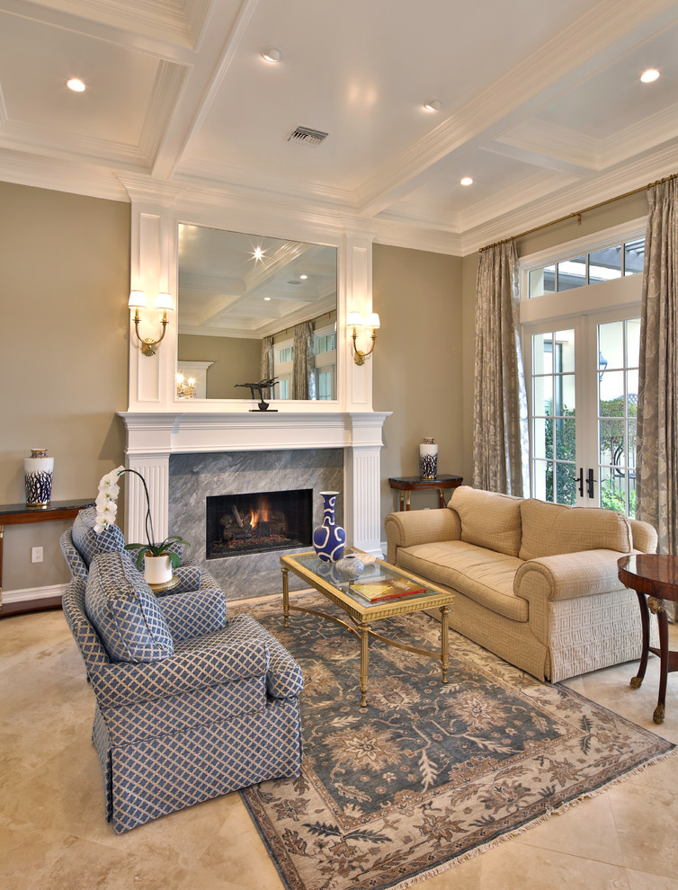 Design ideas for a traditional formal enclosed living room in Los Angeles with a standard fireplace, a stone fireplace surround and beige floor.