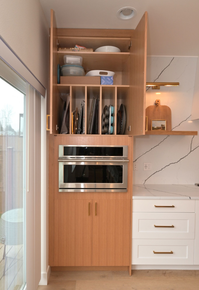 Example of a transitional kitchen design in Seattle