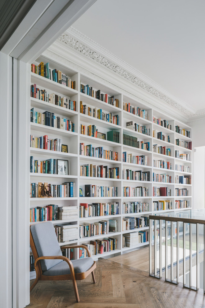 Inspiration for a large scandinavian hallway in Other with white walls, light hardwood floors and brown floor.