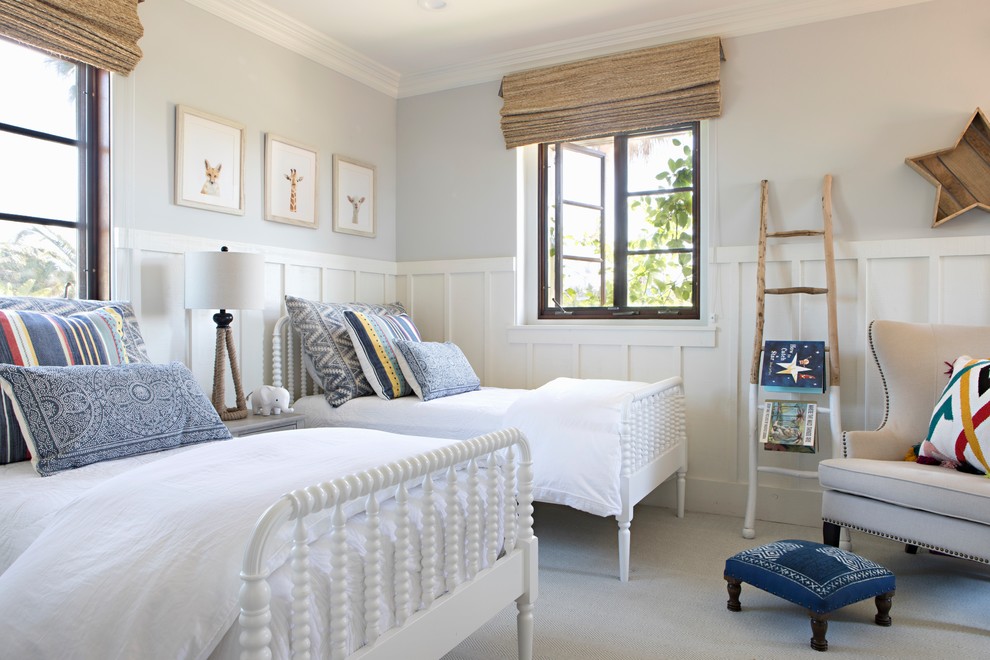 Design ideas for a beach style gender-neutral kids' bedroom for kids 4-10 years old in San Diego with grey walls, carpet and grey floor.