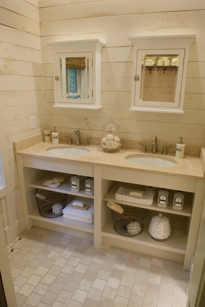 Example of a mountain style bathroom design in Atlanta with an undermount sink, open cabinets and beige cabinets