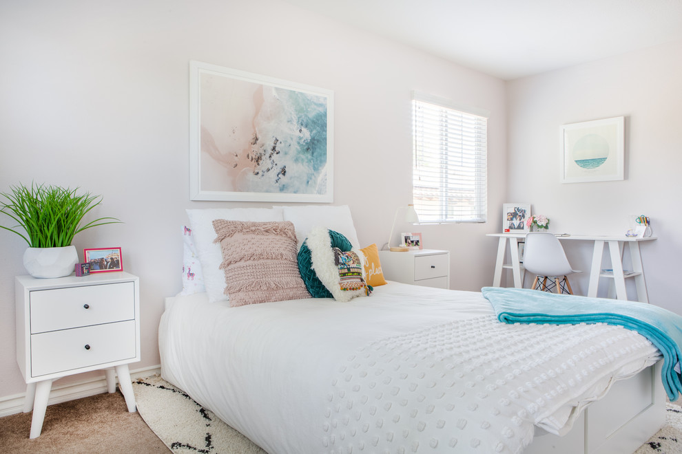 Design ideas for a mid-sized transitional kids' room for girls in Orange County with grey walls, carpet and beige floor.