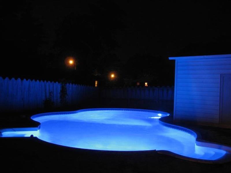 Inspiration for a backyard custom-shaped pool remodel
