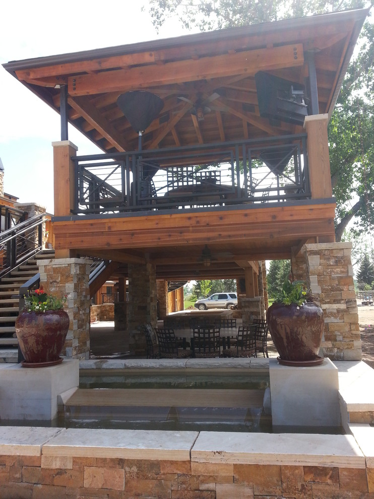 Inspiration for a rustic home design remodel in Denver