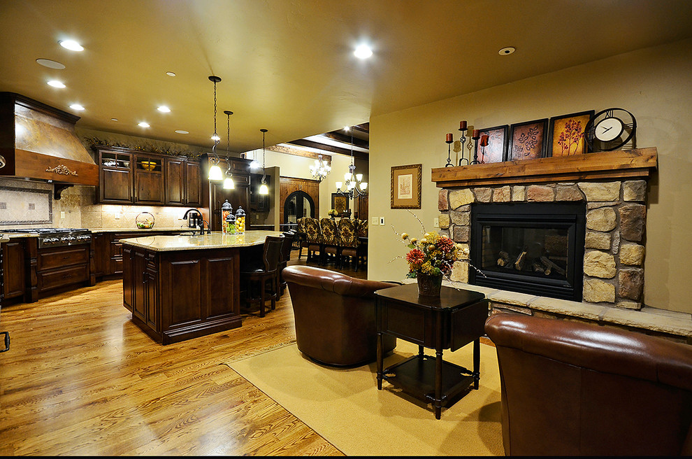 Example of a transitional home design design in Denver