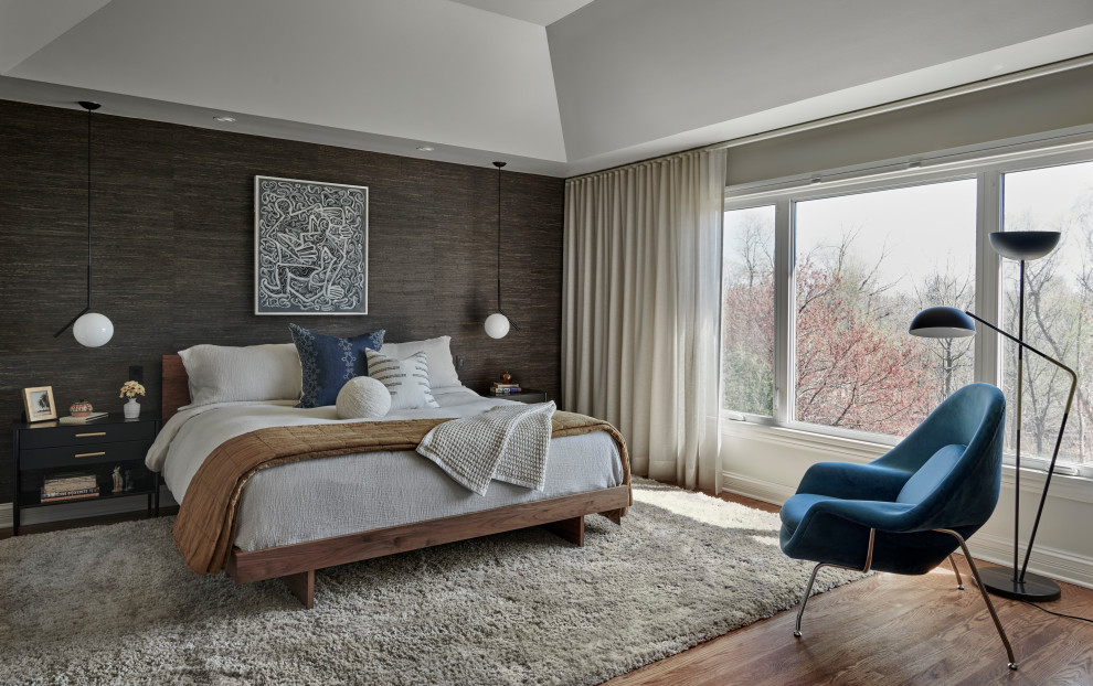 This is an example of a classic grey and brown bedroom in Chicago.