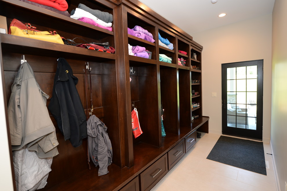 Inspiration for a mid-sized transitional mudroom remodel with white walls