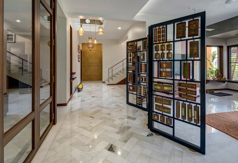 Inspiration for a Mid-sized Asian corridor With White Walls, Marble Floors and Gray.
