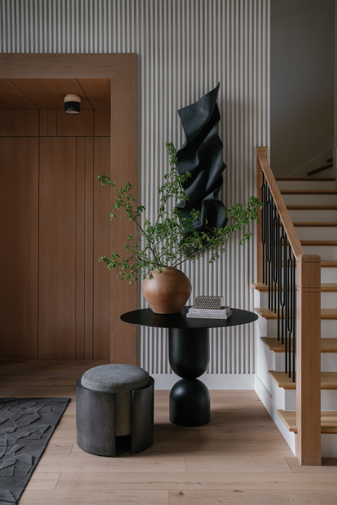Transitional entryway photo in Dallas