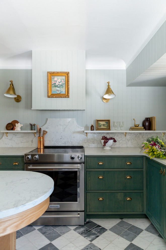 Mid-sized transitional galley marble floor and multicolored floor open concept kitchen photo with green cabinets, quartz countertops, white backsplash, quartz backsplash, stainless steel appliances, an island, white countertops and shaker cabinets