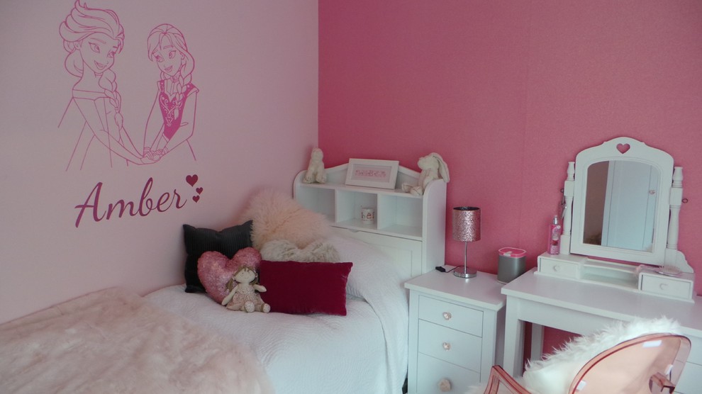 Photo of a contemporary kids' bedroom for kids 4-10 years old and girls in London with pink walls.
