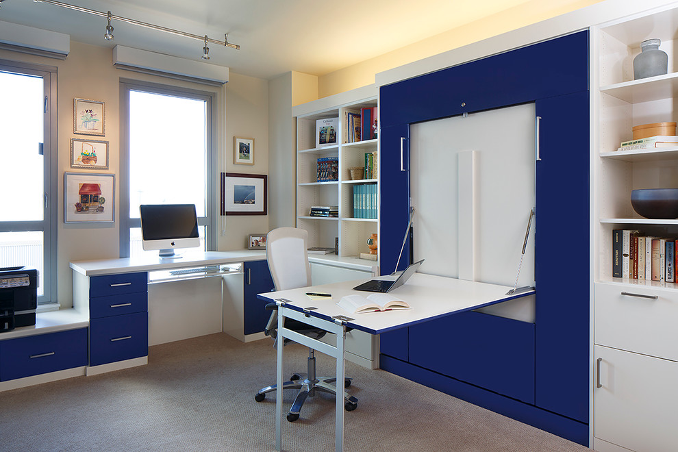 Mid-sized contemporary study room in San Francisco with beige walls, a built-in desk, carpet, no fireplace and beige floor.
